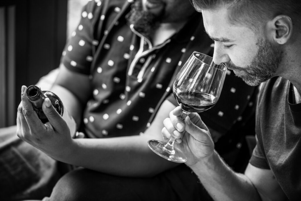 man-tasting-red-wine-with-friends-1024x683.jpg