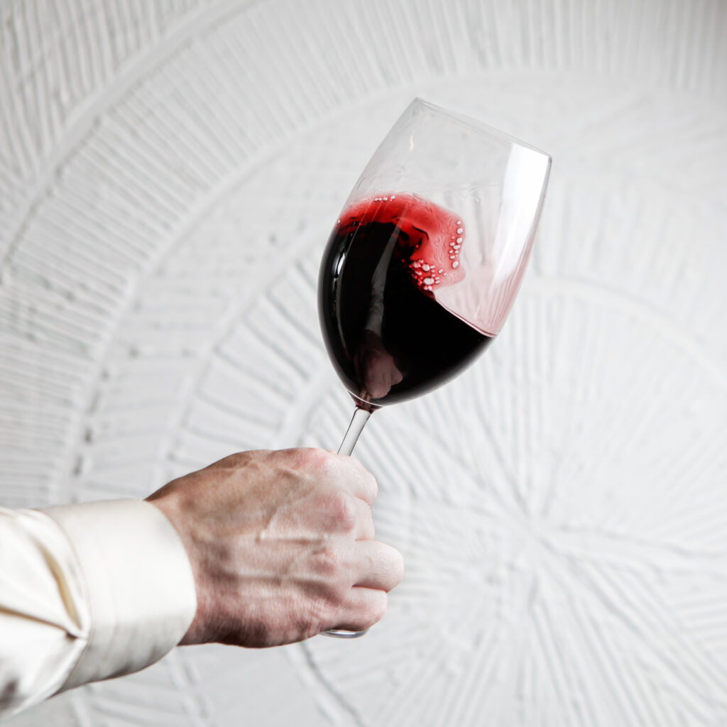 side-view-glass-red-wine-with-human-hand-1024x1024.jpg